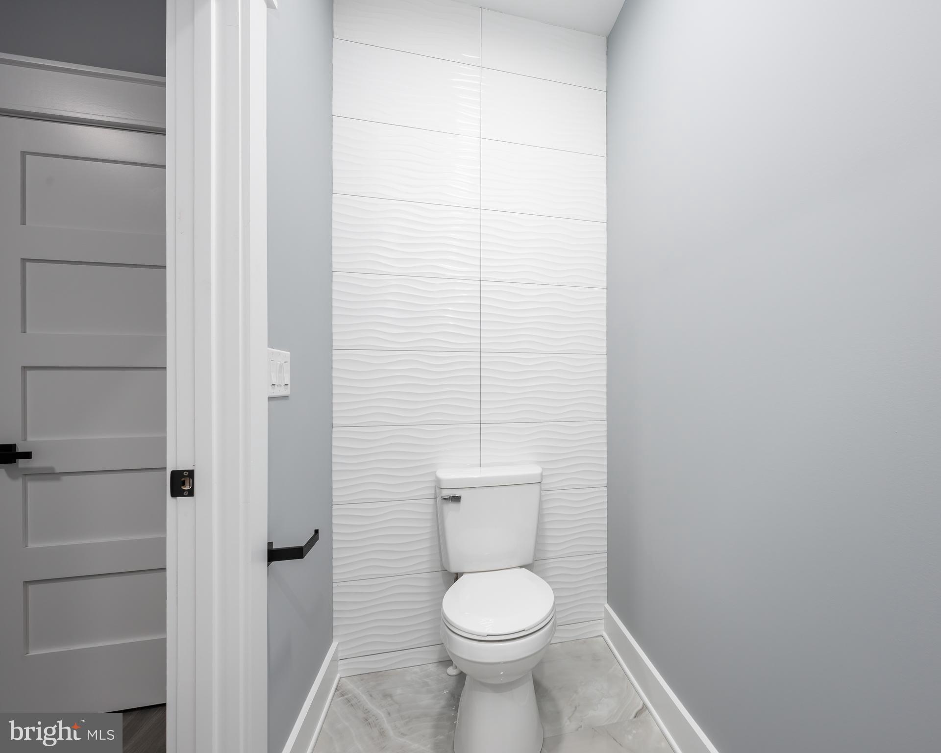 5692 King Stuart Drive Salisbury, MD 21801 - Photo 70 of 82 a bathroom with a toilet