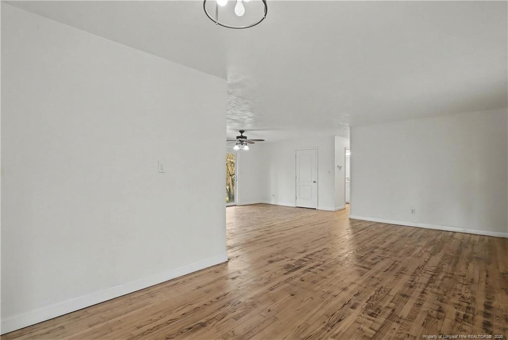 347 Forest Road Lumberton, NC 28358 - Photo 15 of 45 a view of an empty room with wooden floor