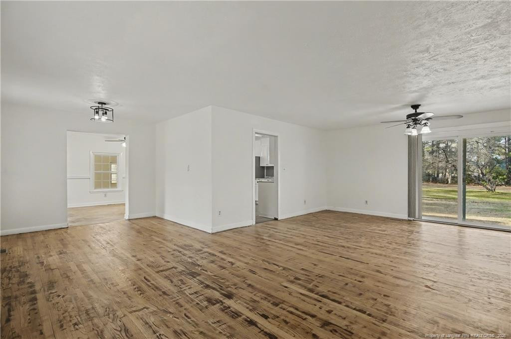 347 Forest Road Lumberton, NC 28358 - Photo 20 of 45 a view of an empty room with glass door