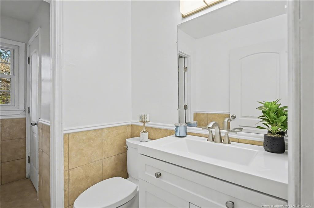 347 Forest Road Lumberton, NC 28358 - Photo 35 of 45 a bathroom with a sink a toilet and shower