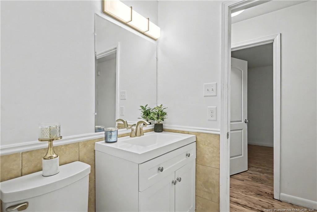 347 Forest Road Lumberton, NC 28358 - Photo 41 of 45 a bathroom with a sink and a mirror