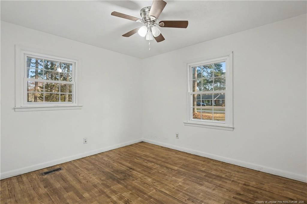 347 Forest Road Lumberton, NC 28358 - Photo 44 of 45 a view of an empty room with a window and a ceiling fan
