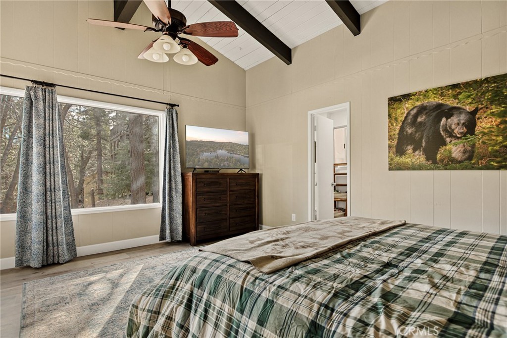 30789 All View Drive Running Springs, CA 92382 - Photo 14 of 25 a bedroom with a large bed and a window