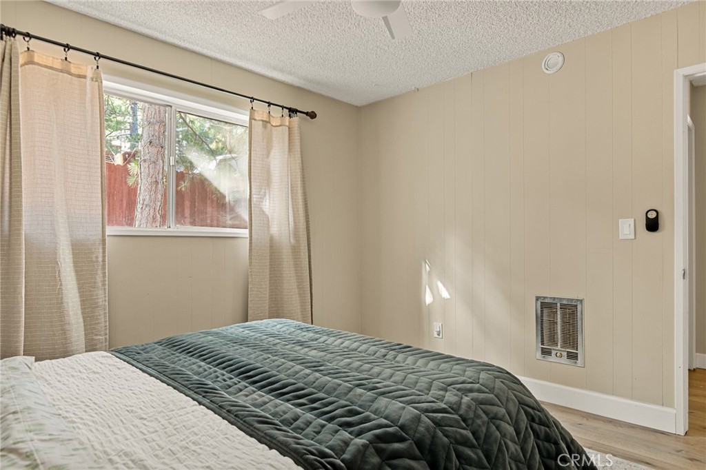 30789 All View Drive Running Springs, CA 92382 - Photo 18 of 25 a bedroom with a bed and a window
