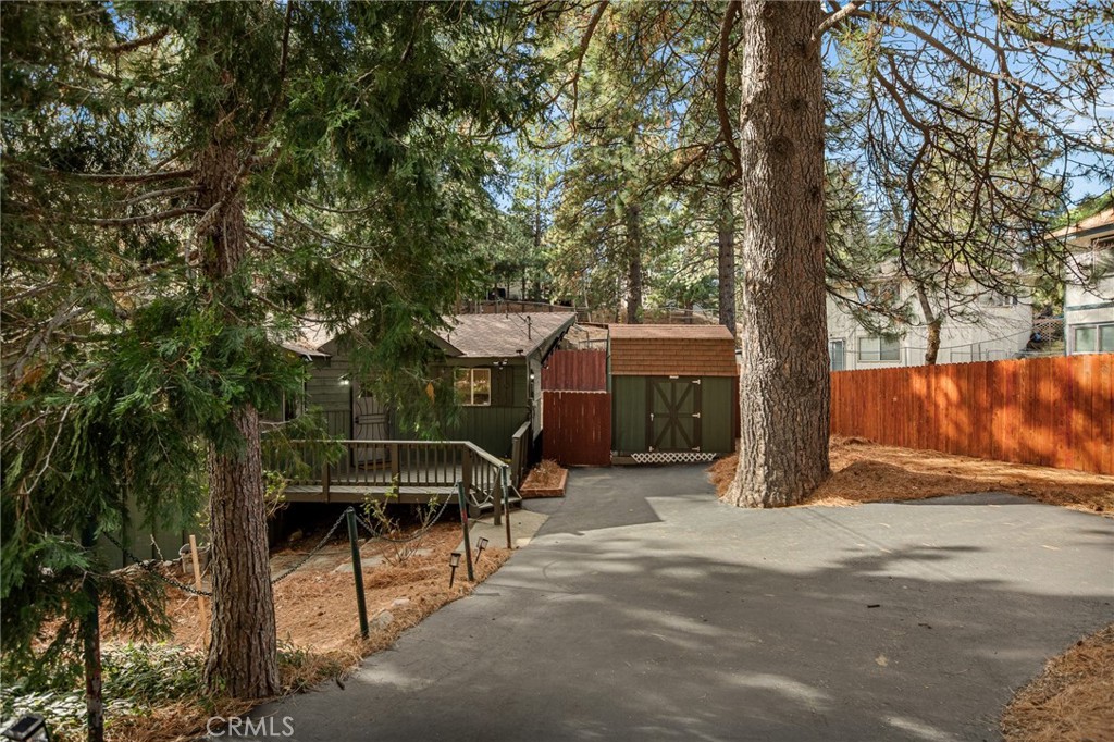 30789 All View Drive Running Springs, CA 92382 - Photo 25 of 25 a view of a bench in a backyard