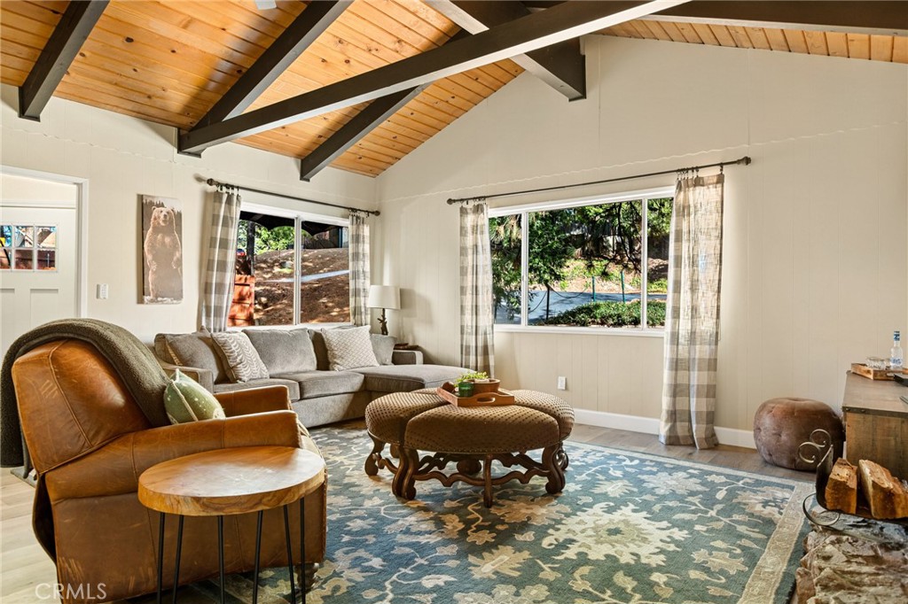 30789 All View Drive Running Springs, CA 92382 - Photo 3 of 25 a living room with furniture and a large window