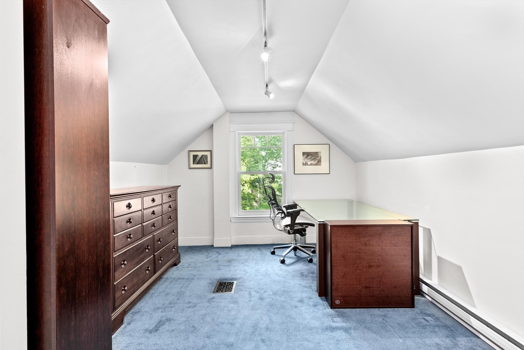 26 Saxon Road Newton, MA 02461 - Photo 22 of 25 wooden floor in an empty room with a window