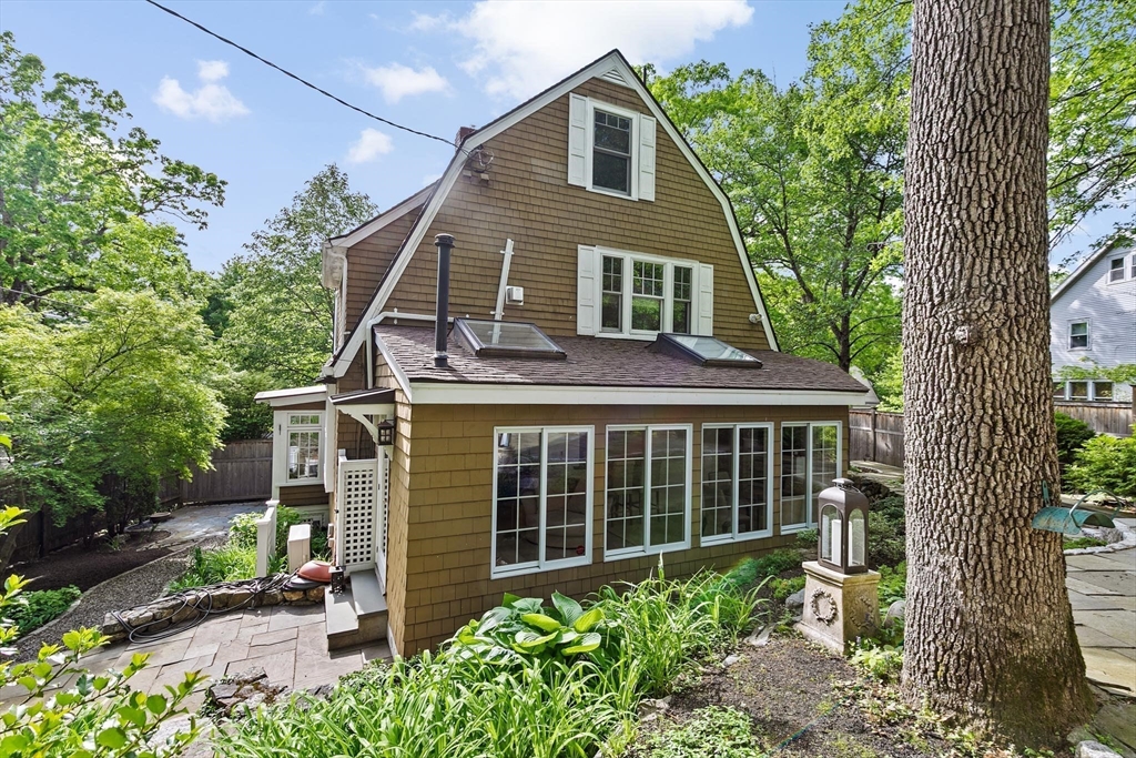 26 Saxon Road Newton, MA 02461 - Photo 24 of 25 a front view of a house with a garden