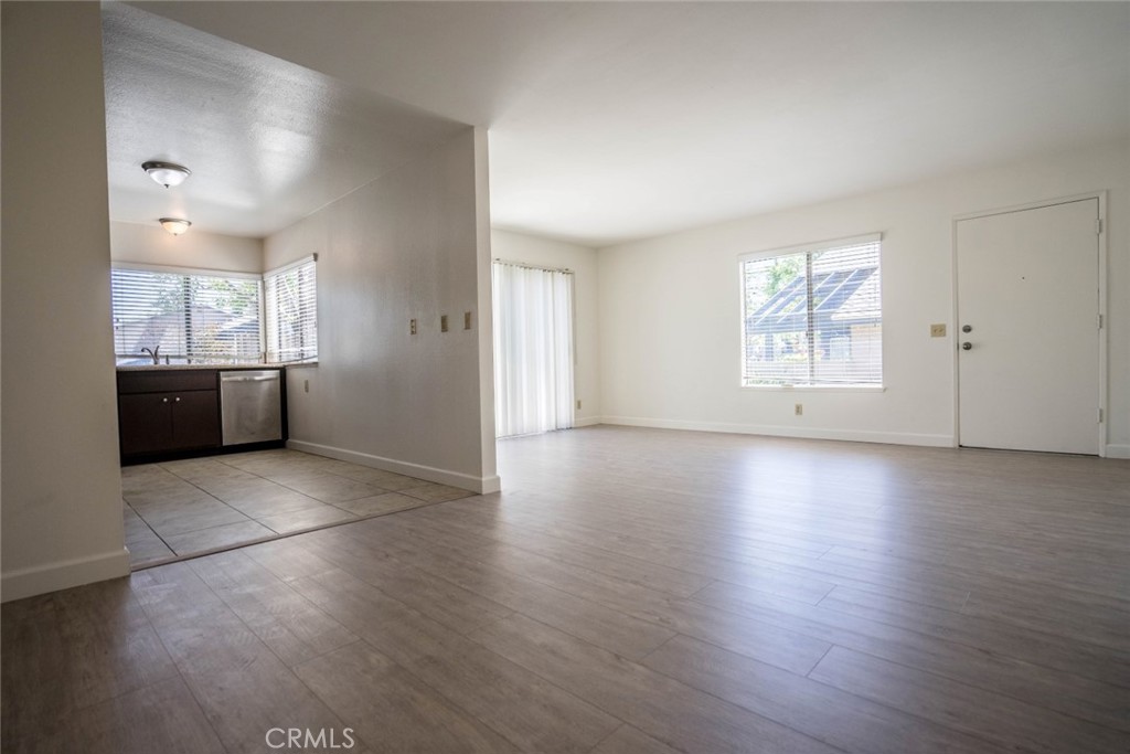 731 Windwood Drive Walnut, CA 91789 - Photo 13 of 15 an empty room with wooden floor and windows
