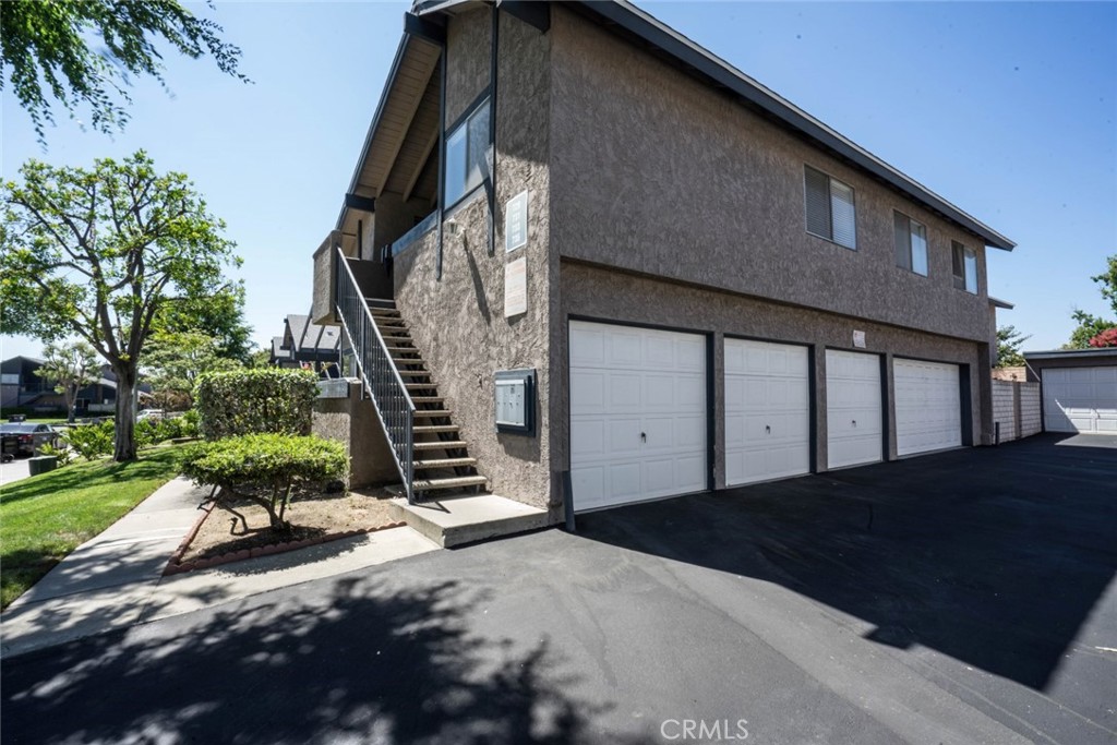 731 Windwood Drive Walnut, CA 91789 - Photo 3 of 15 a front view of a house with a yard