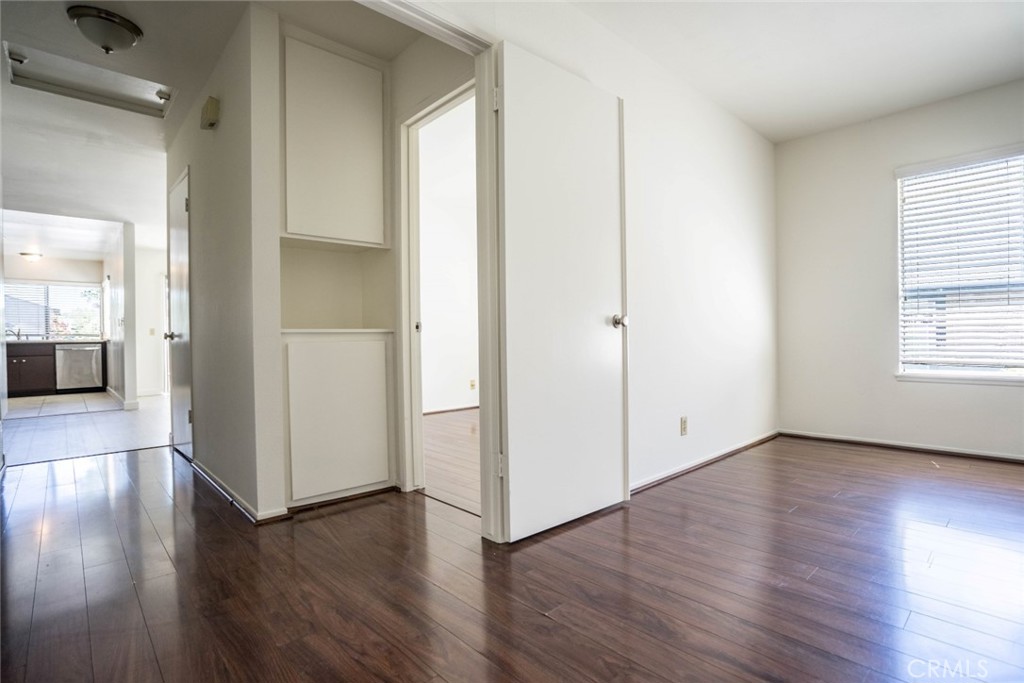 731 Windwood Drive Walnut, CA 91789 - Photo 5 of 15 an empty room with wooden floor & windows