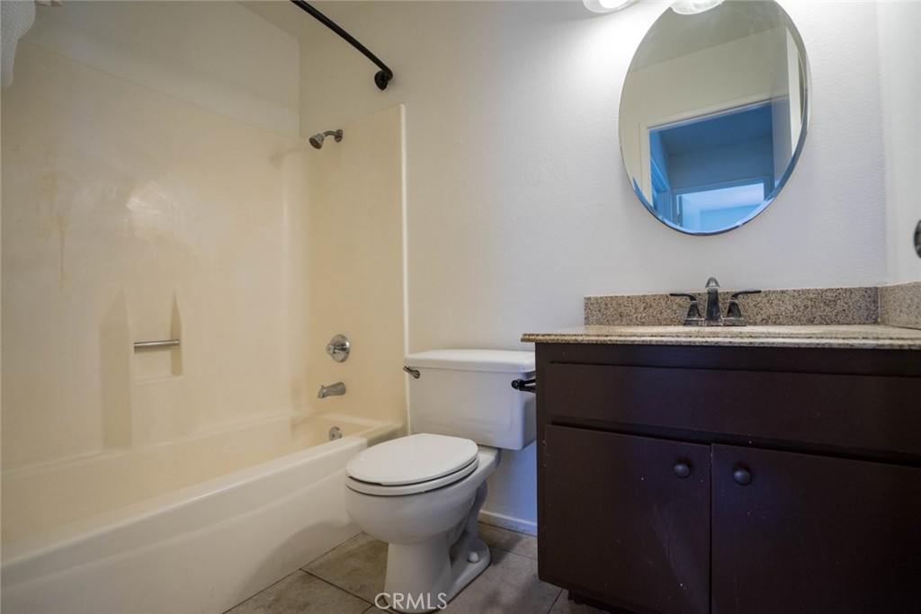 731 Windwood Drive Walnut, CA 91789 - Photo 6 of 15 a bathroom with a sink a toilet and a mirror