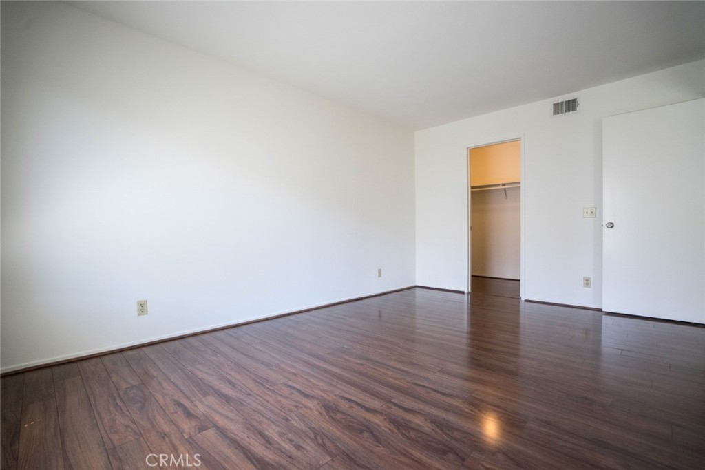 731 Windwood Drive Walnut, CA 91789 - Photo 8 of 15 a view of an empty room and wooden floor