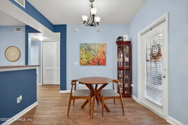 a view of a livingroom with furniture and window
