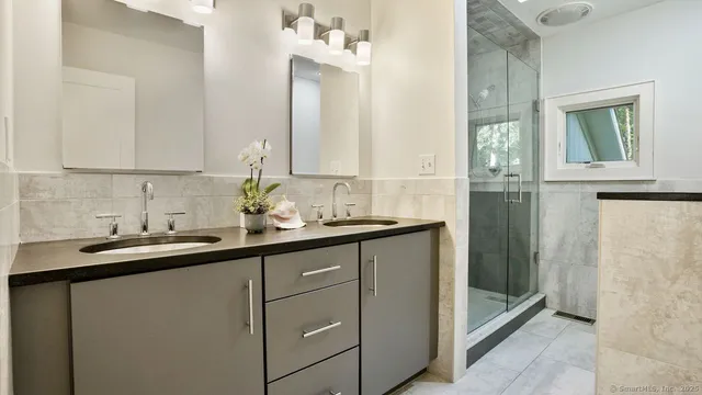 a kitchen with cabinets and window