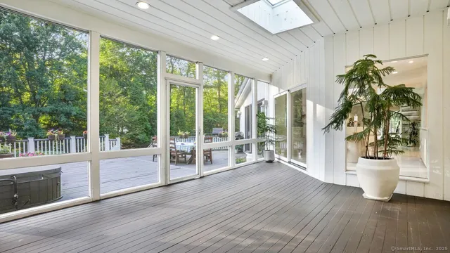 a view of entryway with wooden floor