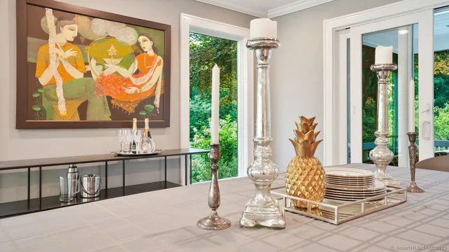 a living room with large windows