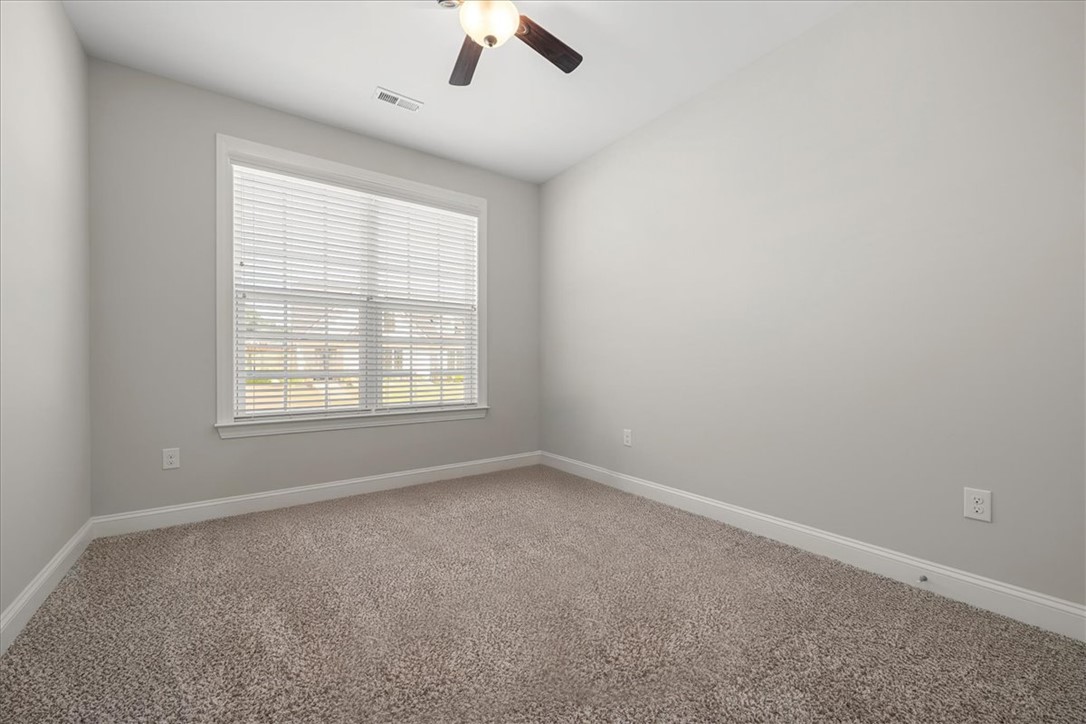 21 Barron Glenn Way Anderson, SC 29621 - Photo 36 of 48 Well-lit bedroom #2 with plush carpeting, and a large double -door closet