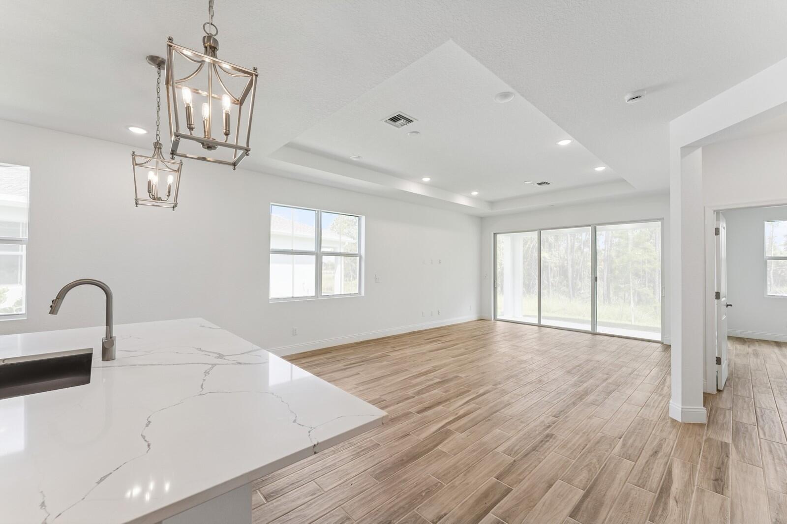 10259 Dreamweaver Road, Unit 31 Port St. Lucie, FL 34987 - Photo 16 of 45 Kitchen, Great Room & Dining Area