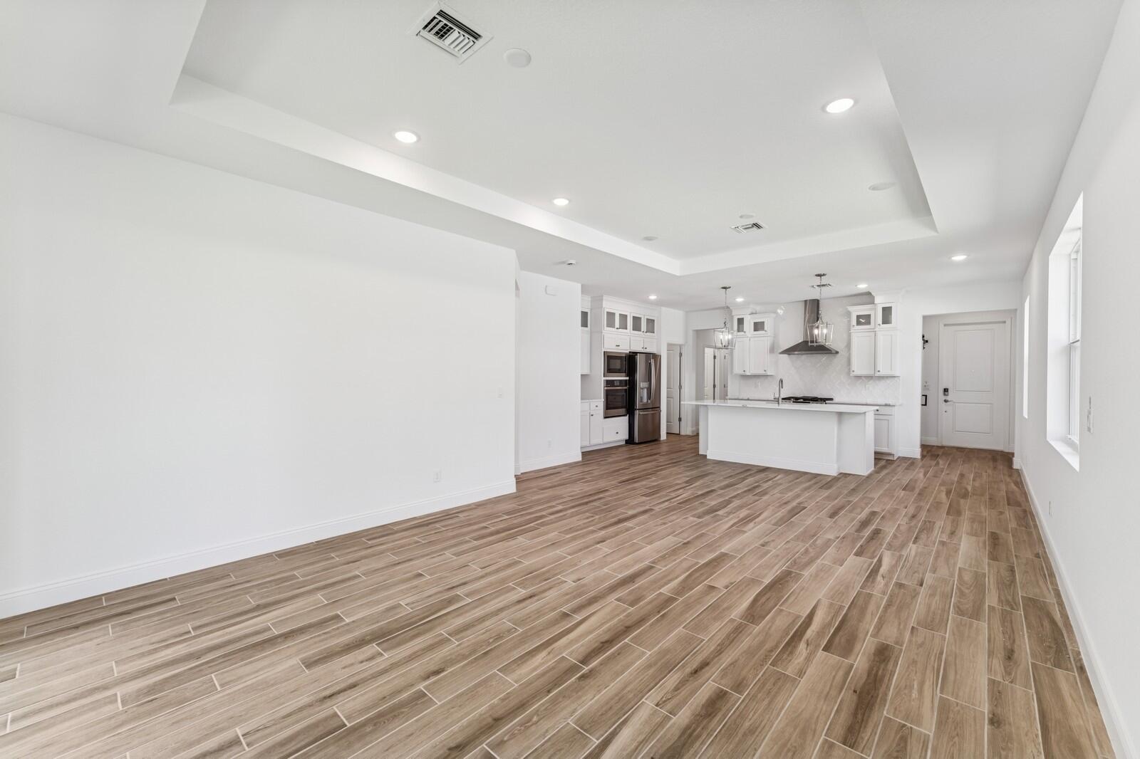 10259 Dreamweaver Road, Unit 31 Port St. Lucie, FL 34987 - Photo 17 of 45 Kitchen, Great Room & Dining Area