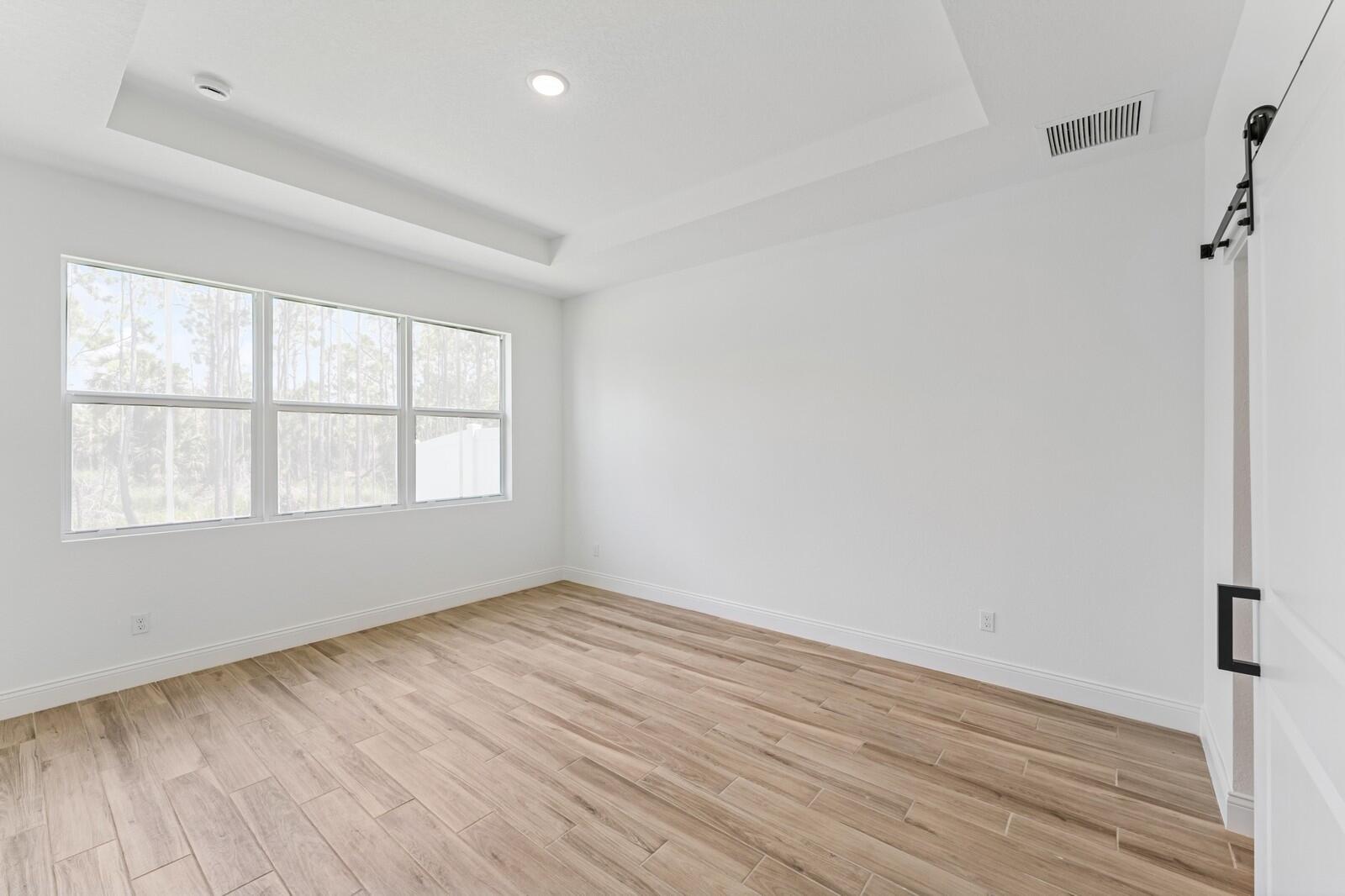 10259 Dreamweaver Road, Unit 31 Port St. Lucie, FL 34987 - Photo 25 of 45 Primary Suite