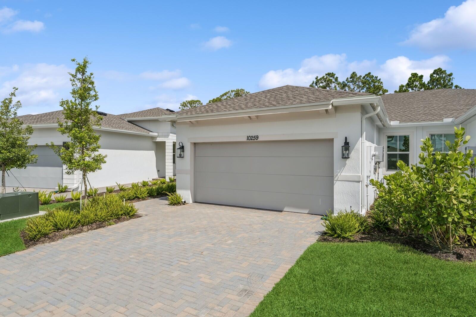 10259 Dreamweaver Road, Unit 31 Port St. Lucie, FL 34987 - Photo 3 of 45 Spanish Modern Elevation