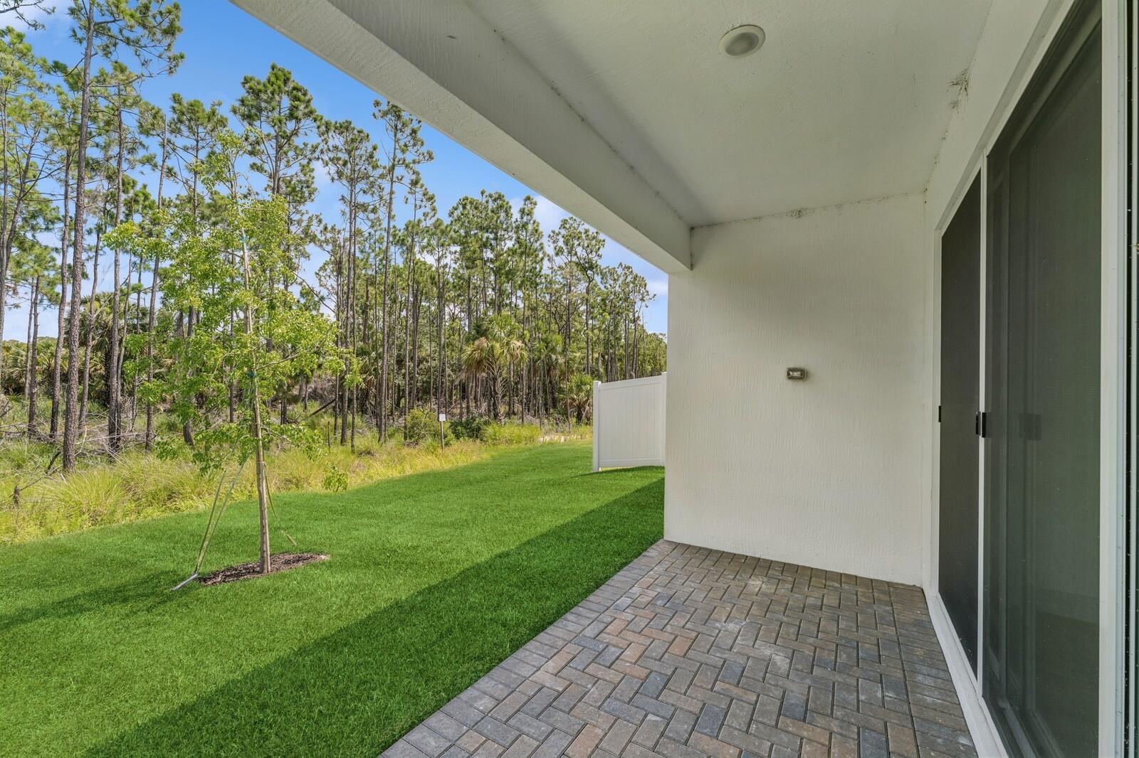 10259 Dreamweaver Road, Unit 31 Port St. Lucie, FL 34987 - Photo 34 of 45 Covered Patio