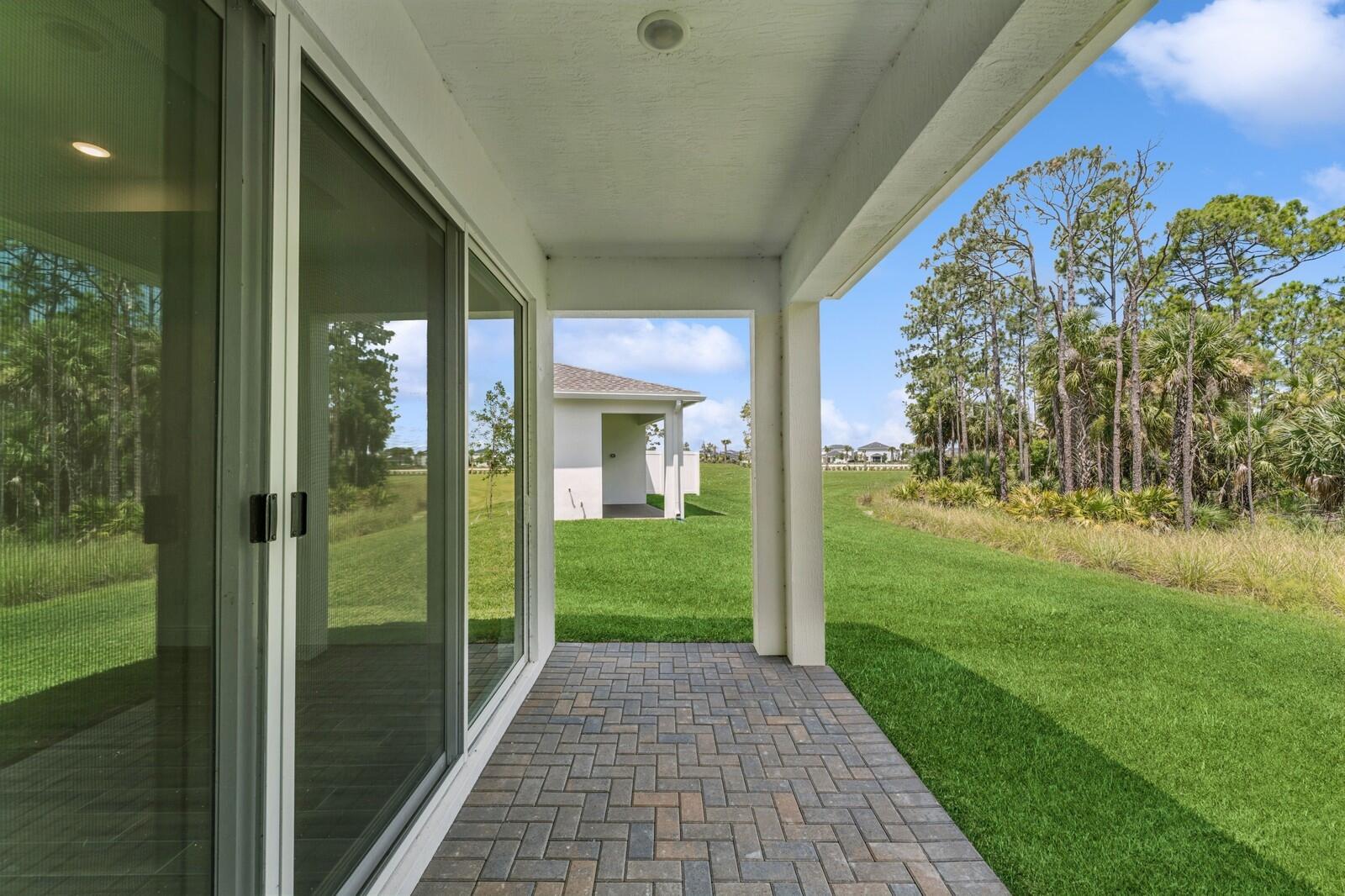 10259 Dreamweaver Road, Unit 31 Port St. Lucie, FL 34987 - Photo 35 of 45 Covered Patio