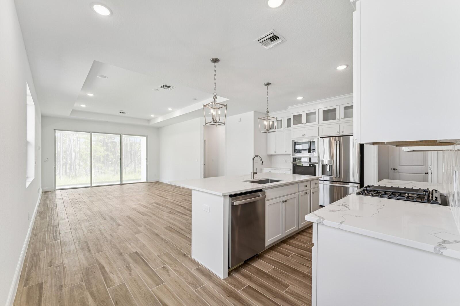 10259 Dreamweaver Road, Unit 31 Port St. Lucie, FL 34987 - Photo 7 of 45 Kitchen, Great Room & Dining Area