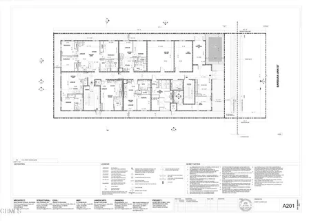 a black and white photo of a living room