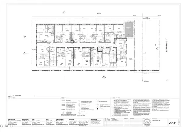 a black and white photo of a living room