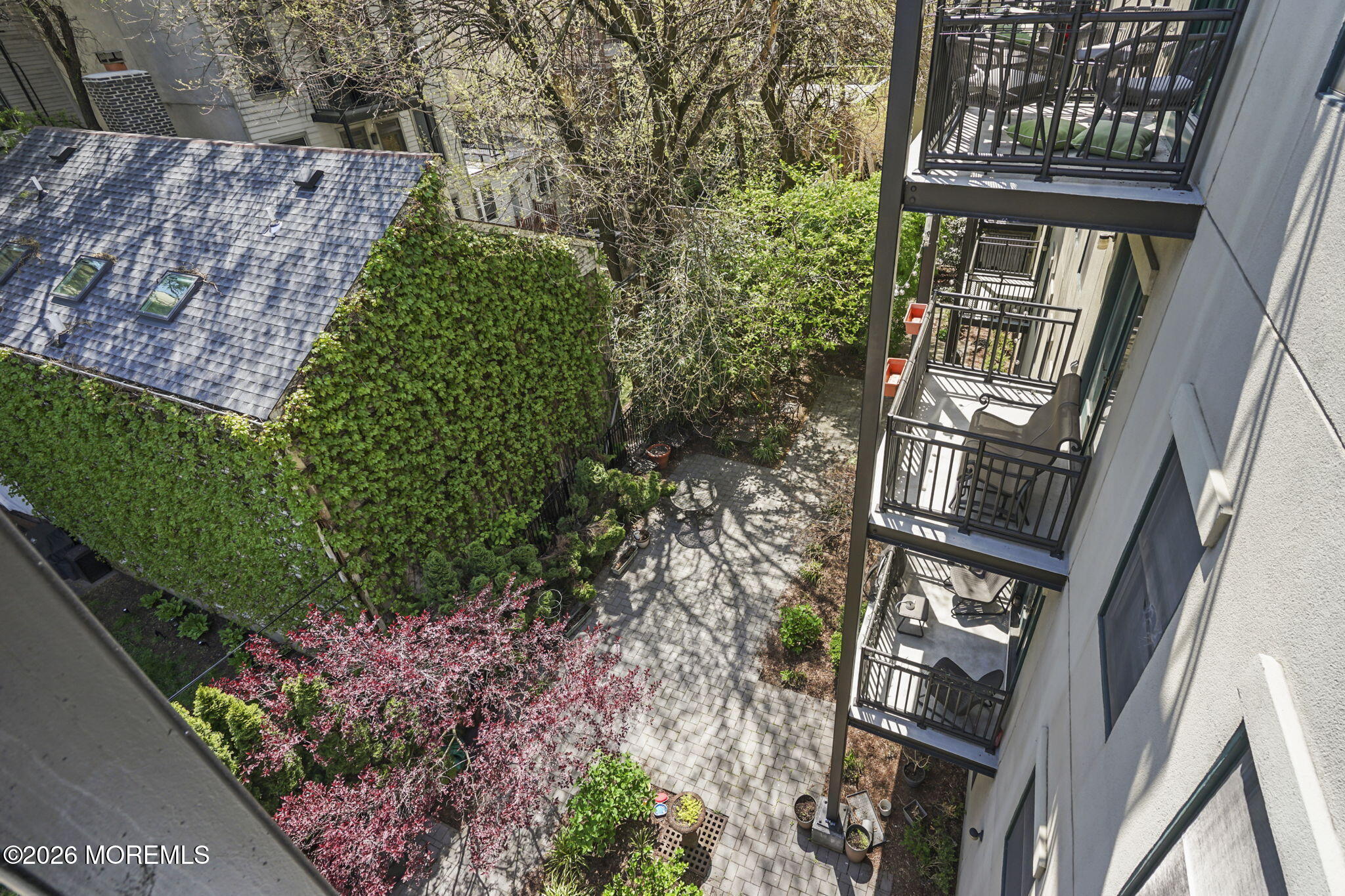 87 Jackson Street, Unit 4B Hoboken, NJ 07030 - Photo 27 of 29 view of backyard from balcony
