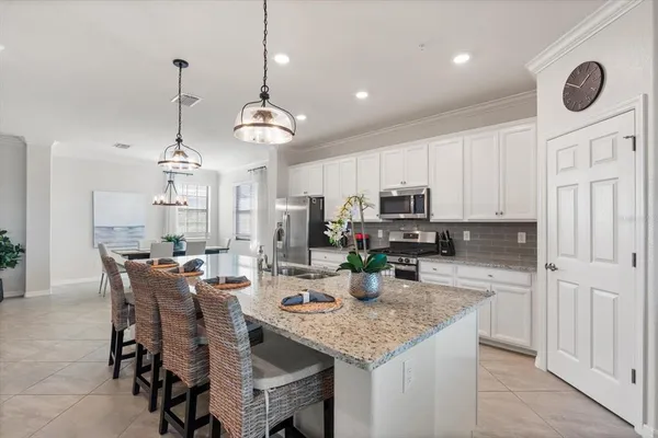 a view of a balcony with furniture