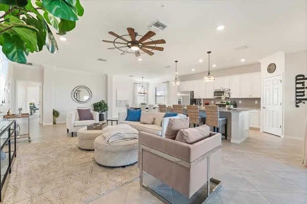 a living room with furniture and a window