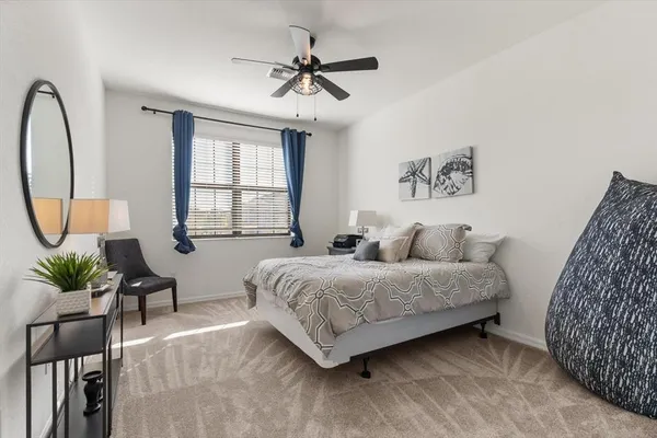 an aerial view of a house with a lake view