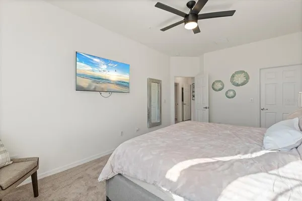 a view of a swimming pool with a house in the background