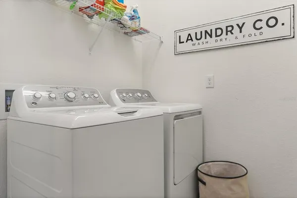 a front view of multiple houses with yard