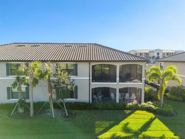 a view of a swimming pool and an outdoor space