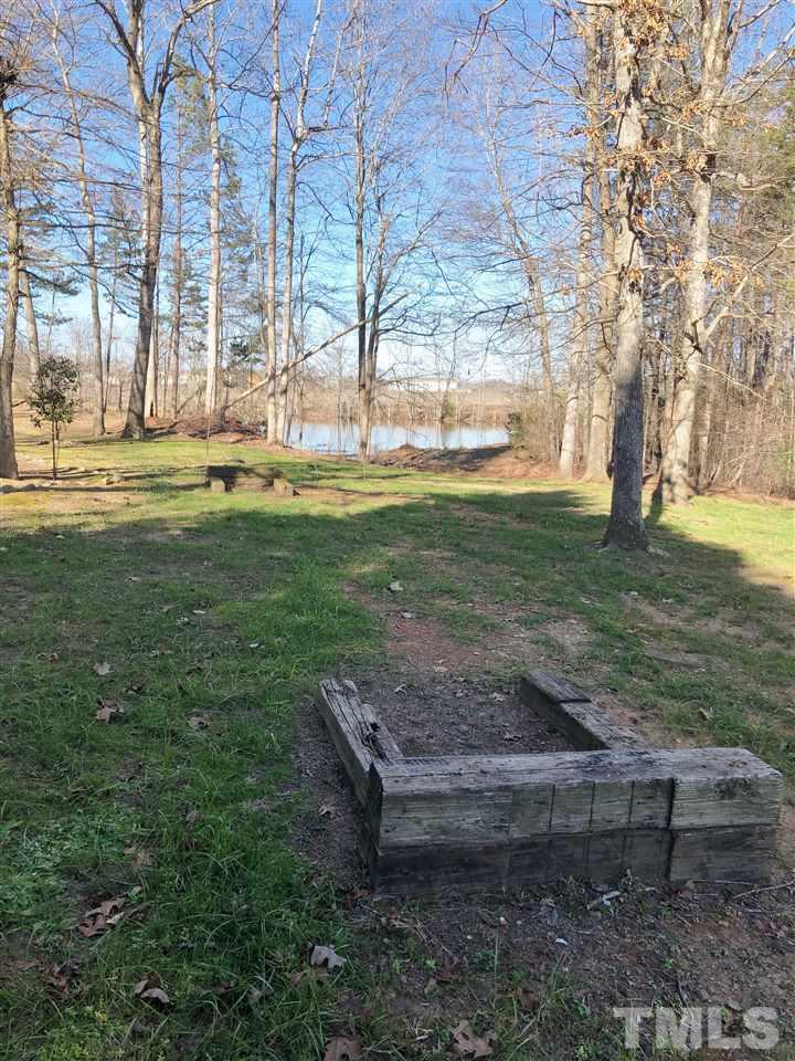 238 Dustin Lane Roxboro, NC 27574 - Photo 23 of 23 a view of a yard with an outdoor space