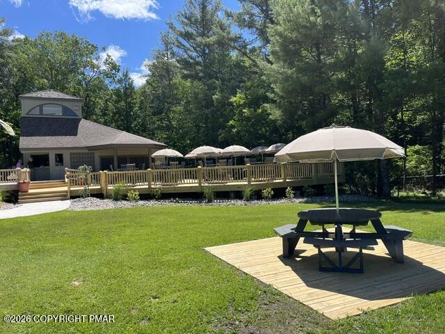 355 Windy Bush Road Long Pond, PA 18334 - Photo 43 of 49 a front view of a house with swimming pool table and chairs