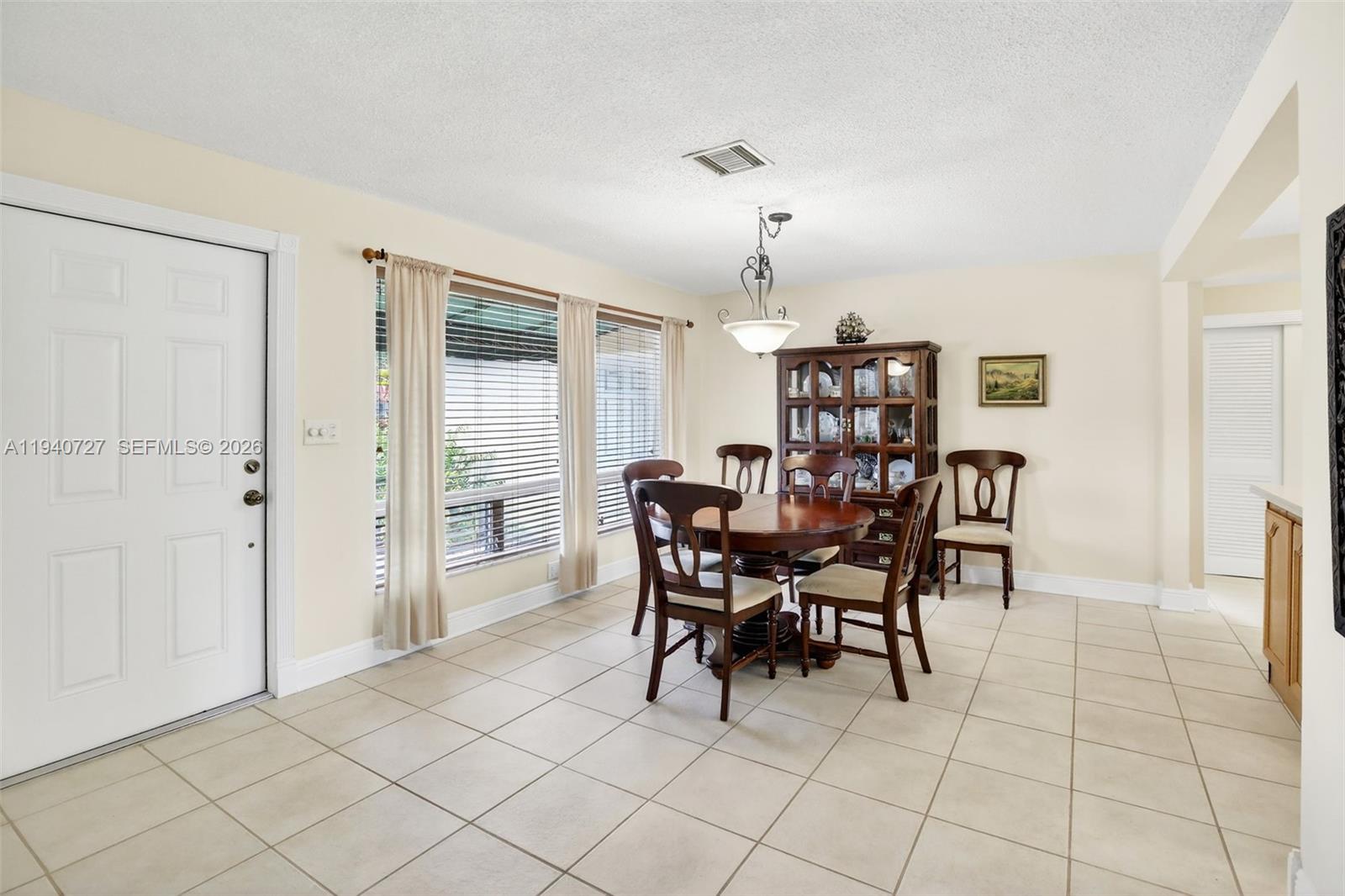 280 Southwest 63rd Avenue Plantation, FL 33317 - Photo 14 of 53 a view of a dining room with furniture