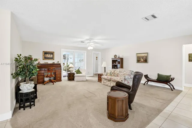 a living room with furniture and a couch