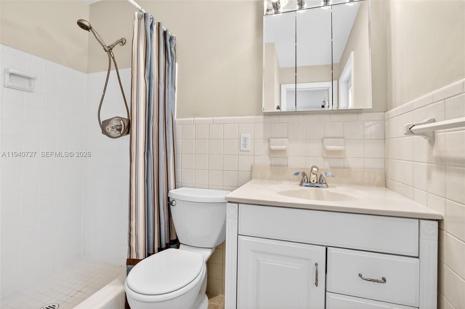 280 Southwest 63rd Avenue Plantation, FL 33317 - Photo 22 of 53 a bathroom with a sink a toilet and shower