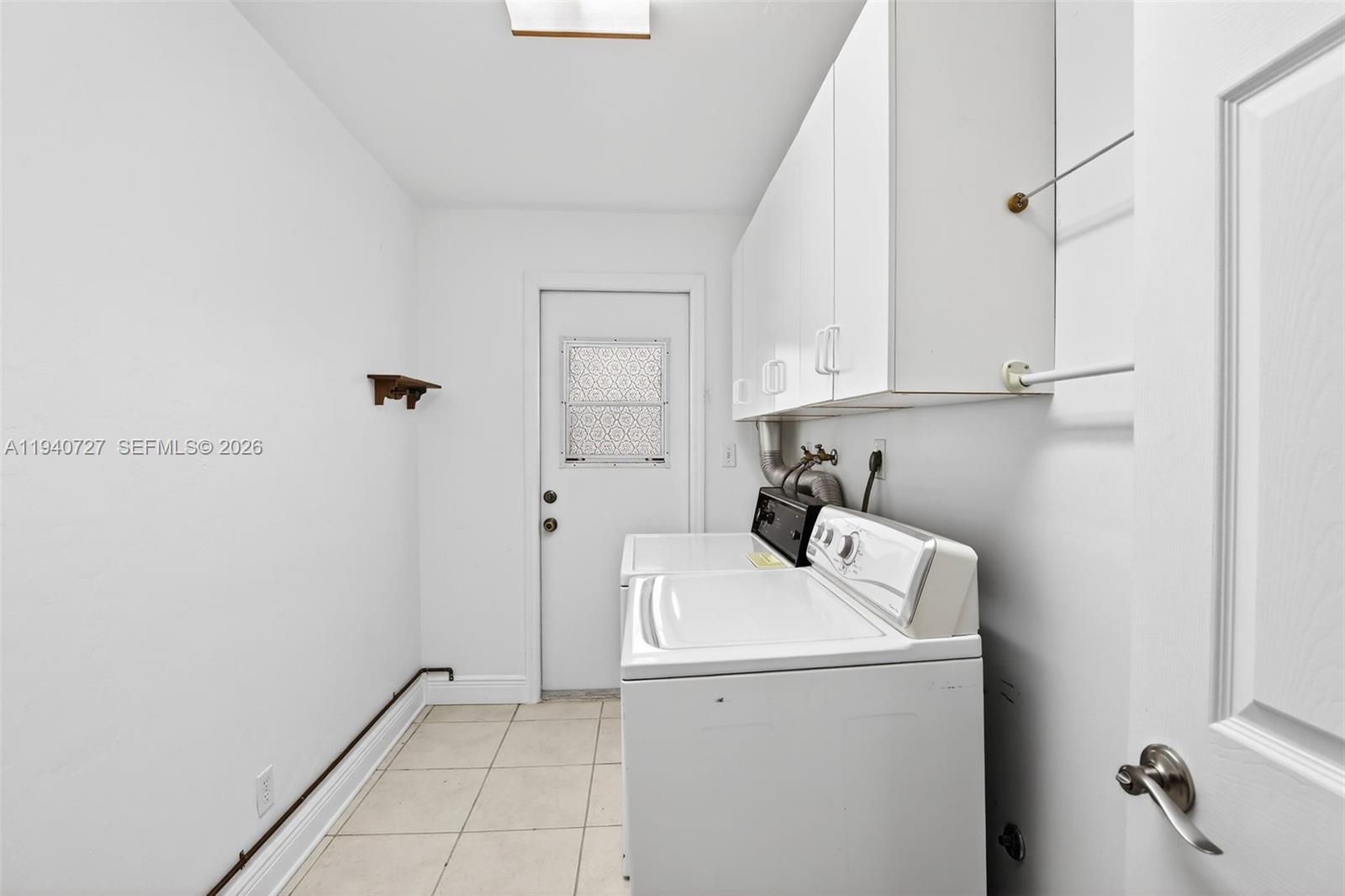 280 Southwest 63rd Avenue Plantation, FL 33317 - Photo 33 of 53 a utility room with dryer and washer