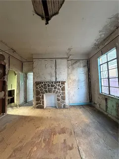 a view of a livingroom with a fireplace