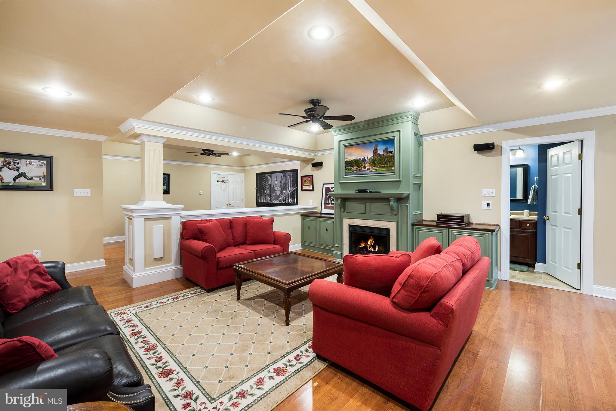6 Rigby Court Garnet Valley, PA 19060 - Photo 36 of 62 Lower Level TV/Movie Room w/ Fireplace