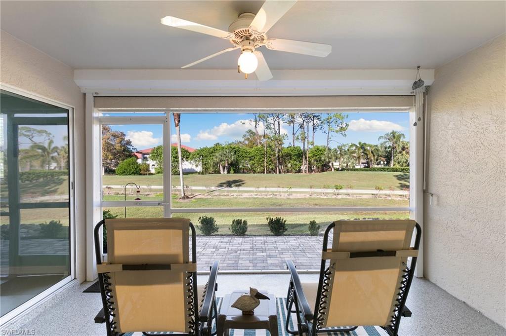 657 St Andrews Boulevard Naples, FL 34113 - Photo 15 of 20 Screened Lanai with golf course view