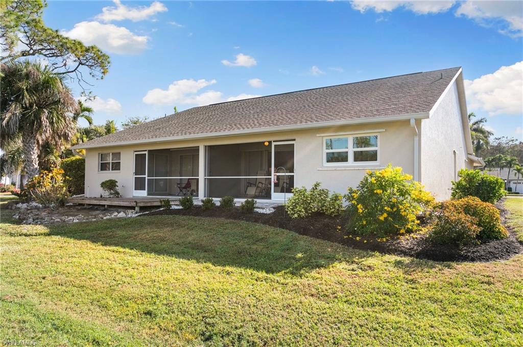 657 St Andrews Boulevard Naples, FL 34113 - Photo 18 of 20 Back facing golf course