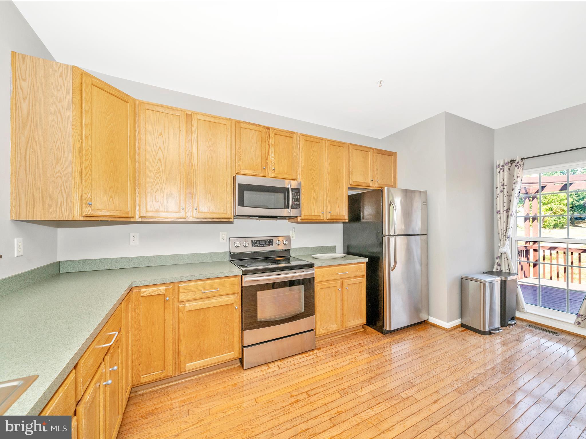 514 Ellison Court Frederick, MD 21703 - Photo 21 of 53 a kitchen with stainless steel appliances granite countertop a refrigerator a stove top oven a sink and dishwasher