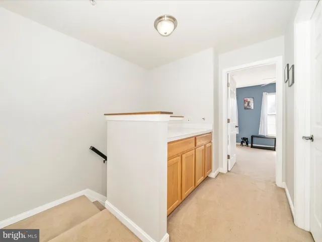 a view of a balcony with wooden floor